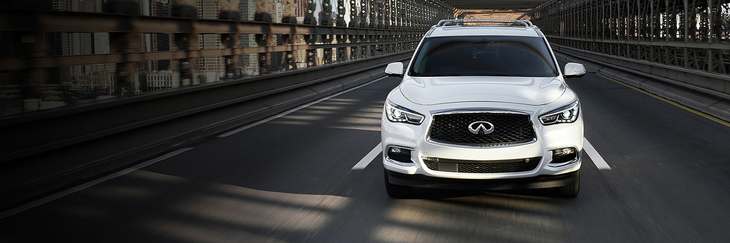 Front profile of a Certified Pre-Owned INFINITI QX60 shown in white color